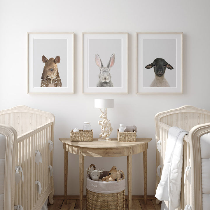 set of three nursery animal prints including a grey rabbit